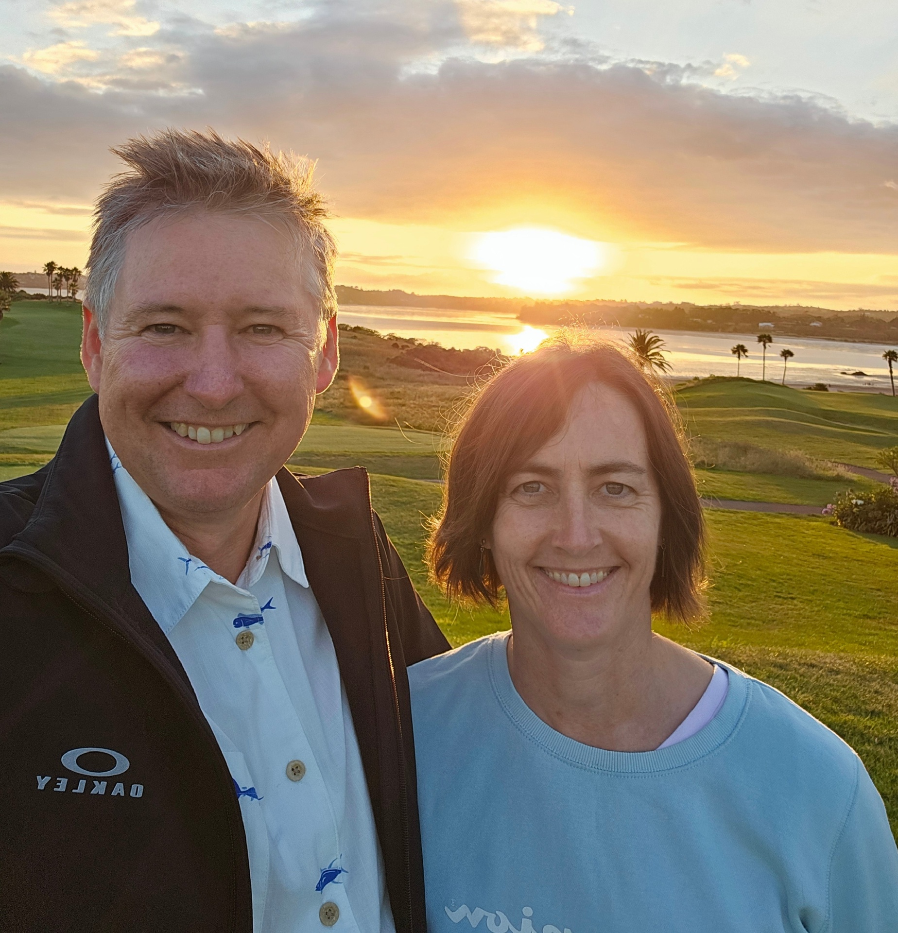 Nathan and Robyn, founders of Mooving Mats, at sunset in Australia